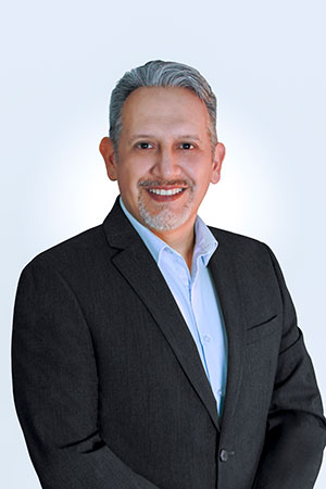 Professional headshot used by Link Socially on a home builder SEO case study focused on reducing internal page competition and search intent overlap.