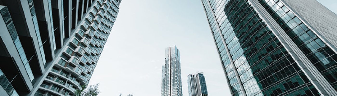 Skyscrapers symbolize Link Socially’s governed system for predictable, revenue-aligned organic growth across search and AI discovery.